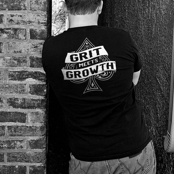 Black Tee Grit Meets Growth Lapel Logo - Unisex