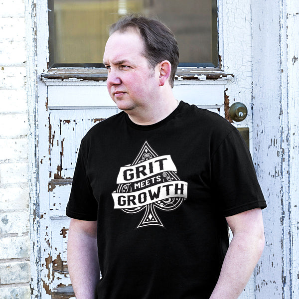 Black Tee Grit Meets Growth Large Logo - Unisex